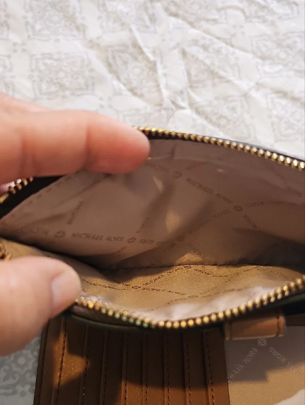 Michael Kors Brown Signature Wristlet with Gold Logo